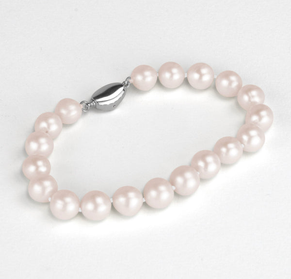 Bracelet  Perles de Cuture d'eau douce  couleur blanc nacré  perles  semi rondes de taille 9 mm avec fermoir Argent 925